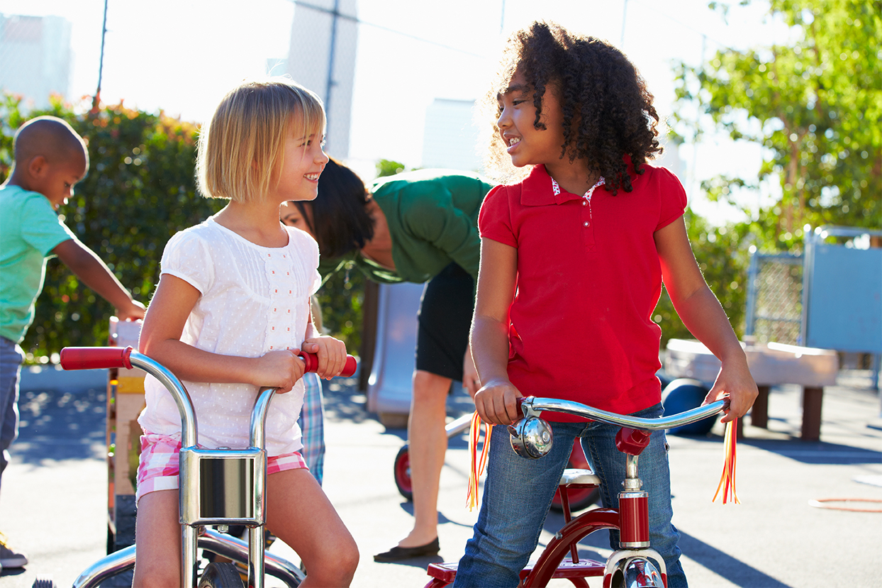 Children Riding To The Park